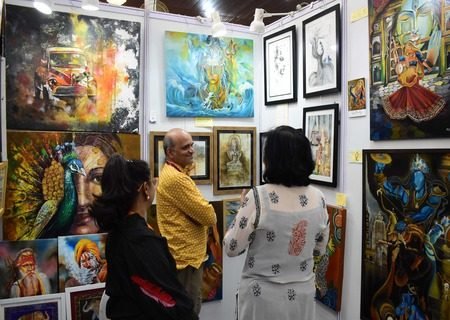 Collectors along the main gallery wall