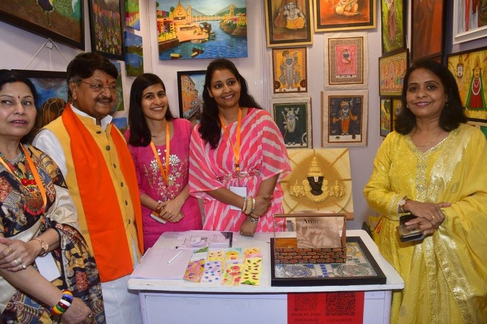 Artists beside their own stalls